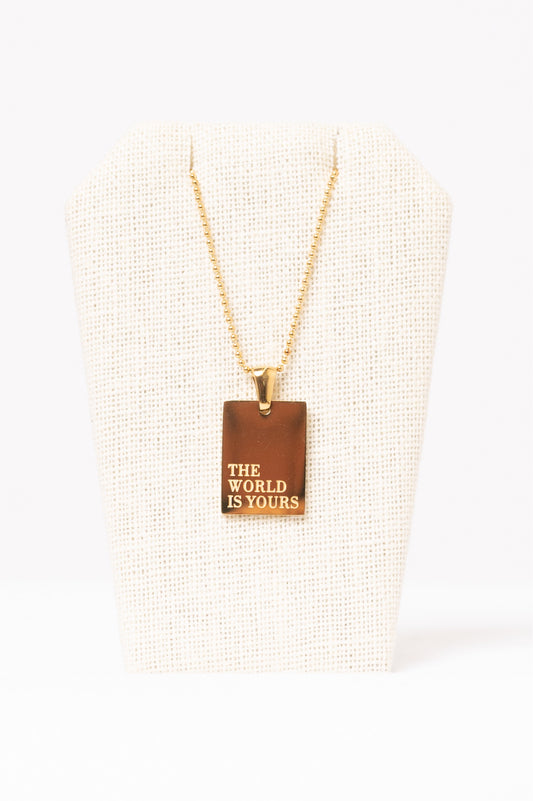 THE WORLD IS YOURS NECKLACE